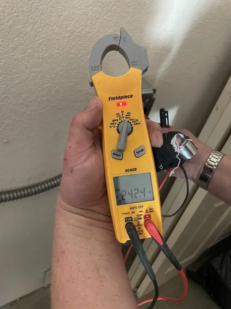 Voltage testing with clamp meter during Generator Installation in Collins